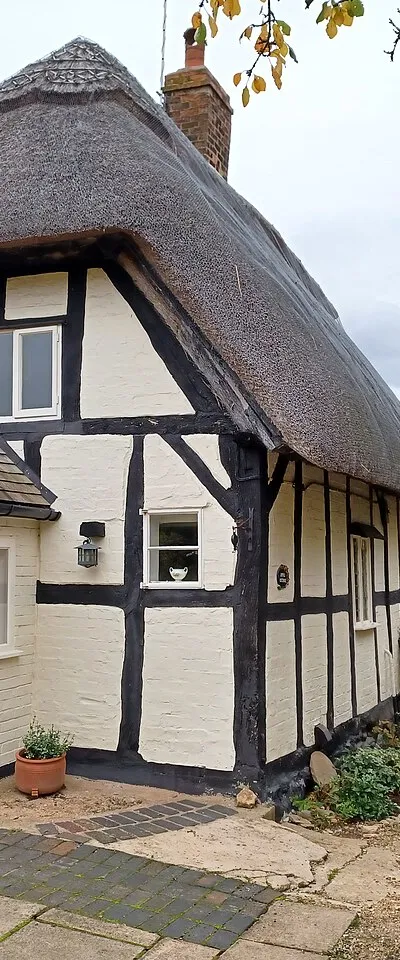 April Cottage and Robbins, Great Comberton, Worcestershire, England. 17th century, Grade II listed as April Cottage.