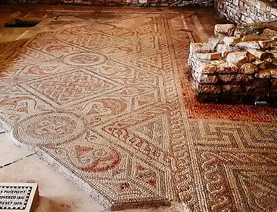 North Leigh Roman Villa Mosaic detail. The villa is near Fawler, whose Old English name, fāg flōr, means "variegated floor"; authorities including J. R. R. Tolkien have taken this to mean that the village was named for the presence of the mosaic floor.