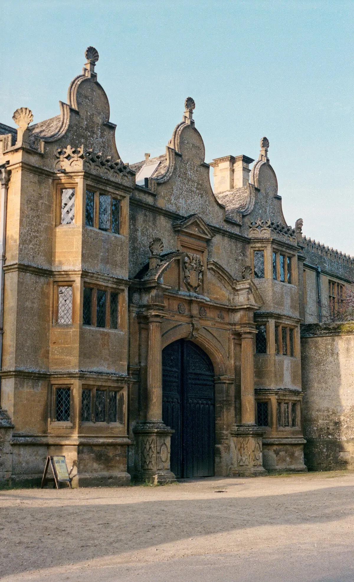 1992 Spring photograph of the entrance to Stanway House at its south-west, on Cotswold Way in Stanway, Gloucestershire, England.Processing: SLR camera Kodak Gold ASA 200-2 film negative scanned with an Epson Perfection V800 using SilverFast 8 scan program, and optimized, cropped and spun with DxO OpticsPro 10 Elite and Adobe Photoshop CS2.