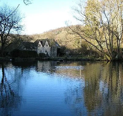Baker's Mill Looking across the mill pond towards Baker Mill.  The shadows cast by the low winter light helps emphasise the narrowness of the valley at this point.