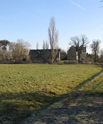 Odda's Chapel, Abbot's Court and (left) Odda's Barn, Deerhurst, Gloucestershire, seen from the northwest