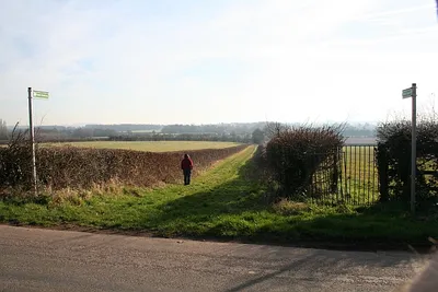 Bridleway and Footpath from the Hook A most curious arrangement (there must be a good story behind this), on one side of the hedge is a broad trackway which is a public bridleway whilst on the other side is a public footpath entered by a sheep proof kissing gate. the two combine at the bottom of the hill and the route continues up to Lower Hook.