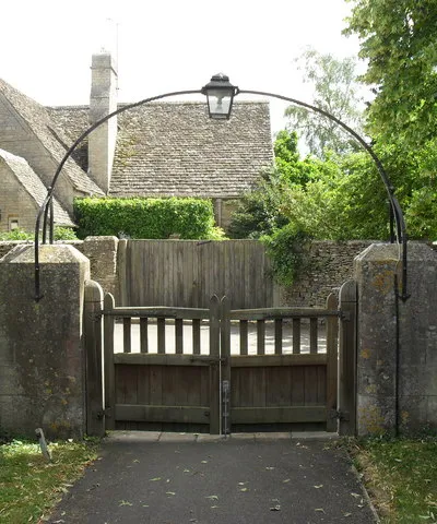 Church gates, St. Michael &amp; All Angels, Poulton, Gloucestershire, Great Britain.