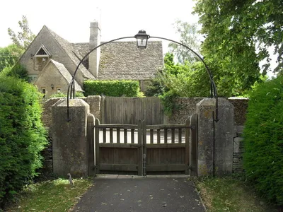 Church gates, St. Michael & All Angels, Poulton, Gloucestershire, Great Britain.