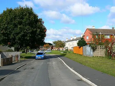 Avebury Road, Penhill, Swindon. Penhill is a local authority housing estate developed in the early to mid 1950s. Swindon Borough Council took advantage of the Town Development Act 1952 to expand at a rapid rate in the post-war years. The theme for the naming of the roads and closes in the estate is Wiltshire towns and villages. Avebury is famous for its old rocks 567773