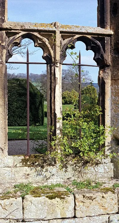 1992 Spring photograph of a cinquefoil-headed twin-light window in the ruins of the mid-15th-century castle, at the Grade I listed Sudeley Castle, near Winchcombe, Gloucestershire, England.Processing: Analogue camera with Kodak Gold ASA 200-2 film. Negative scanned with an Epson Perfection V800 using SilverFast 8 scan program, and optimized, cropped and spun with DxO OpticsPro 10 Elite and Adobe Photoshop CS2.