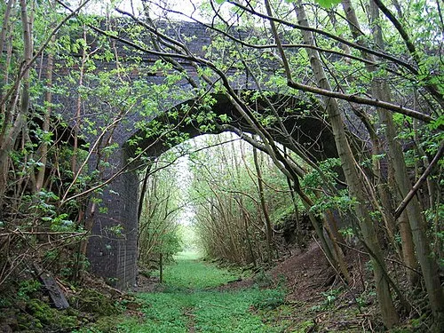 Railway Bridge over Notgrove Railway Cutting. This bridge crosses the dismantled Banbury and Cheltenham Direct Railway just west of Notgrove. It is now a Site of Special Scientific Interest because of the Jurassic limestones exposed here.