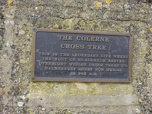 plaque on the raised bed holding "the Colerene Holy Cross Tree"