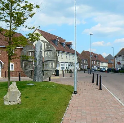 Alexandra Park, Swindon. This relatively small development of new houses is on the site of a former RAF hospital. The stone and plaque at the lower left of the image can be see in close-up here 837750 There is quite a large abstract sculpture present as well.