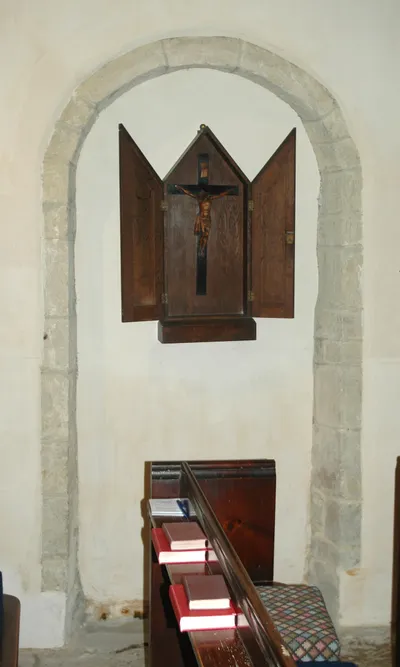 Church of England parish church of St Margaret, Little Faringdon, Oxfordshire: interior view of blocked Norman north doorway