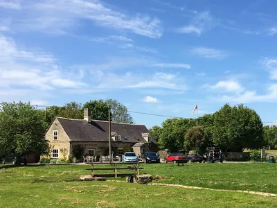 The King's Head inn standing on the green, Bledington