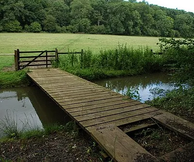 Bridge over the River Coln This bridge over the River Coln provides access to the meadow on the other side of the river, it is not a public right of way.