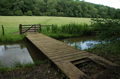 Bridge over the River Coln This bridge over the River Coln provides access to the meadow on the other side of the river, it is not a public right of way.