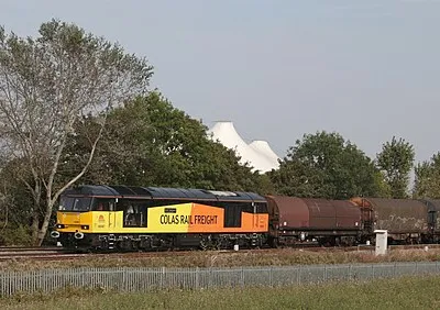 60 087 CLIC Sargeant of Colas Rail hauls the Tilbury-Llanwern scrap train through Milton Park running 40 mins late on 17th Sept 2014