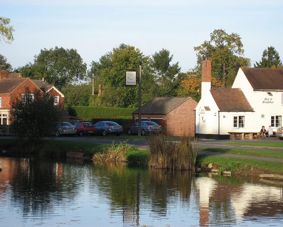 Pond and pub at the village of Hanley Swan, Worcestershire, England