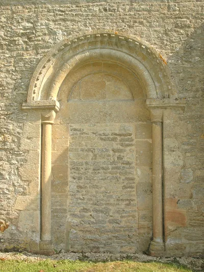 Blocked south doorway of St Peter's parish church, Wilcote, Oxfordshire, viewed from the outside.