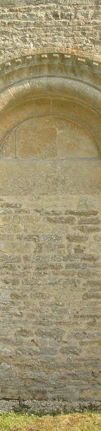 Blocked south doorway of St Peter's parish church, Wilcote, Oxfordshire, viewed from the outside.