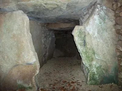 Looking towards the western end chamber inside Uley Long Barrow