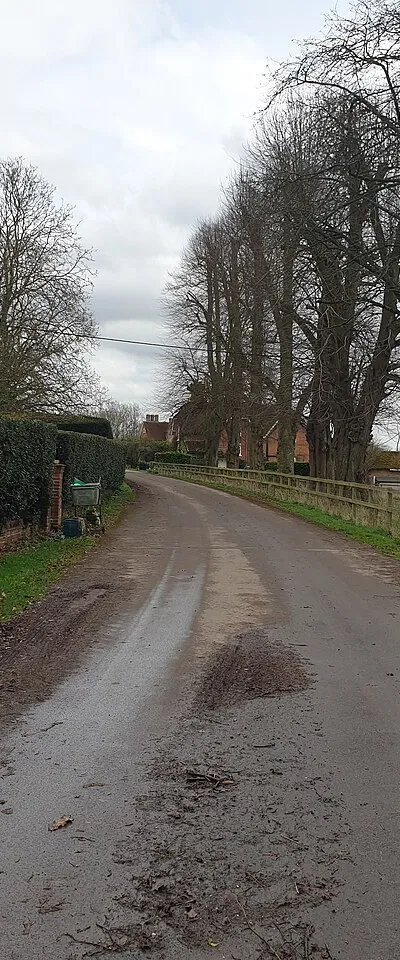 Drive past Marsh Benham Lodge