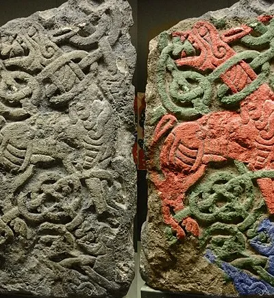 Original in the Gloucester City museum. Left hand shows original and right hand shows false colour version to pick out the figures and knots. Found in a wall near St. Oswald's Priory, Gloucester, this cross fragment is dated to the 9th Century.