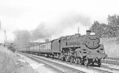 BR Standard 4-6-0 on Down express near Haresfield, 1956