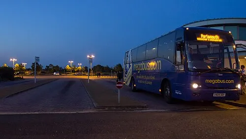 A Megabus coach at Water Eaton Parkway, Oxfordshire. The coach is registration mark V909 DDY, fleet number 52659, on route M34.