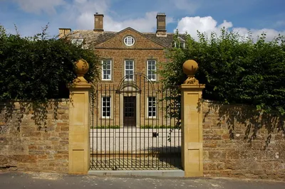 The gates to Whichford House, Church End, Whichford, Warwickshire, seen from the south