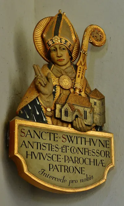 Compton Beauchamp: St. Swithun's Church: St. Swithun holding the church by Martin Travers