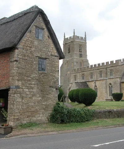 Church and lych gate, Long Compton. The lych gate at Long Compton is unusual in that it is a small cottage with a room on the first floor above the entrance.