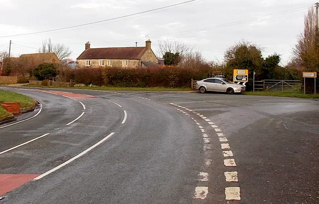 A sharp bend in Gloucester Road, Little Haresfield