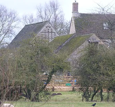 Grade II listed building in Hampton Poyle, Oxfordshire. Listed as "Outbuilding approximately 5 metres north west of Manor Farmhouse".
.mw-parser-output .messagebox{margin:4px 0;width:auto;border-collapse:collapse;border:2px solid var(--border-color-progressive,#6485d1);background-color:var(--background-color-neutral-subtle,#fbfcff);color:var(--color-base,#202122);box-sizing:border-box;border-inline-start-width:8px}.mw-parser-output .messagebox.mbox-small{font-size:88%;line-height:1.25em}.mw-parser-output .mbox-warning,.mw-parser-output .mbox-speedy{border:2px solid var(--border-color-error,#b22222);background:var(--background-color-error-subtle,#ffdbdb);border-inline-start-width:8px}.mw-parser-output .mbox-serious,.mw-parser-output .mbox-delete,.mw-parser-output .mbox-stop{border:2px solid var(--border-color-error,#b22222);border-inline-start-width:8px}.mw-parser-output .mbox-issue,.mw-parser-output .mbox-content{border:2px solid #f28500;background:var(--background-color-warning-subtle,#ffe);border-inline-start-width:8px}.mw-parser-output .mbox-query,.mw-parser-output .mbox-style{border:2px solid #f4c430;background:var(--background-color-warning-subtle,#ffe);border-inline-start-width:8px}.mw-parser-output .mbox-shit{border:2px solid #960;border-inline-start-width:8px}.mw-parser-output .mbox-license{border:2px solid #88a;border-inline-start-width:initial}.mw-parser-output .mbox-legal{border:2px solid var(--border-color-notice,#666);background:var(--background-color-base,#fff);border-inline-start-width:8px}.mw-parser-output .mbox-honor{border:2px solid #ca3;background:var(--background-color-warning-subtle,#fcf4db);border-inline-start-width:8px}.mw-parser-output .mbox-growth{border:2px solid #8d4;background:var(--background-color-success-subtle,#d5fdf4);border-inline-start-width:8px}.mw-parser-output .mbox-move{border:2px solid #93c;border-inline-start-width:8px}.mw-parser-output .mbox-protection,.mw-parser-output .mbox-message{border:2px solid var(--border-color-base,#aaa);border-inline-start-width:8px}.mw-parser-output .messagebox .mbox-text{border:none;padding:0.25em 0.9em;width:100%}.mw-parser-output .messagebox .mbox-image{border:none;padding:2px 0 2px 0.9em;text-align:center}.mw-parser-output .messagebox .mbox-imageright{border:none;padding:2px 0.9em 2px 0;text-align:center}.mw-parser-output .messagebox .mbox-empty-cell{border:none;padding:0;width:1px}.mw-parser-output .messagebox .mbox-invalid-type{text-align:center}@media(min-width:720px){.mw-parser-output .messagebox{margin:4px 10%}.mw-parser-output .messagebox.mbox-small{clear:right;float:right;margin:4px 0 4px 1em;width:238px}}body.skin--responsive .mw-parser-output table.messagebox img{max-width:none!important}Wikidata has entry Outbuilding approximately 5 metres north west of Manor Farmhouse (Q26514697) with data related to this item.