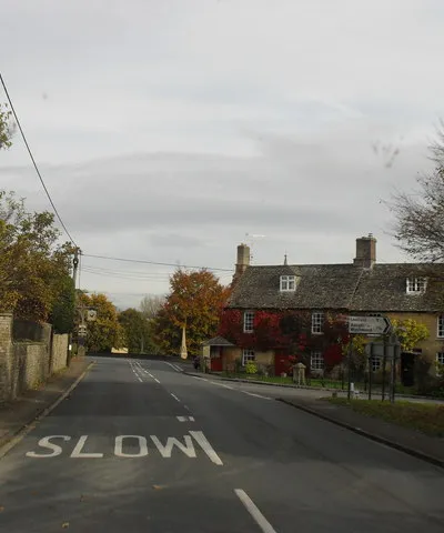 A361 through Shipton Under Wychwood This is roughly the centre of the village. The road off to the right is to Ascott Under Wychwood, and Leafield.