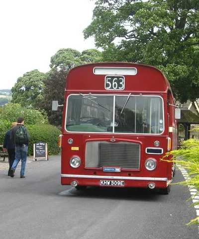 Miserden Classic Bus. A Bristol RE bus, now preserved having been run by the Cheltenham &amp; District bus company, calling at Miserden on the Stroud Vintage Bus Running Day. It is fleet number 1003, registration plate KHW 309E.