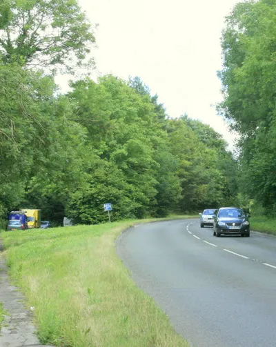 A4 heading east through Derry Woods The route of the road before improvements makes a convenient layby on the left.