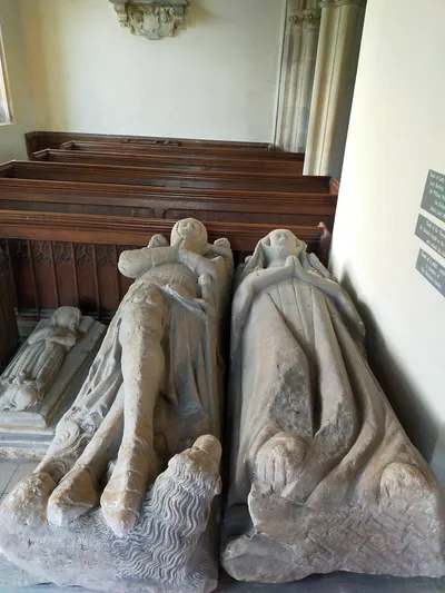 The tomb of Sir Thomas Berkeley (d. 1365) and his wife Joan at St Giles's Church, Coberley, Gloucestershire.