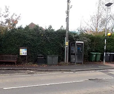 Bench and silver phonebox, Shaw