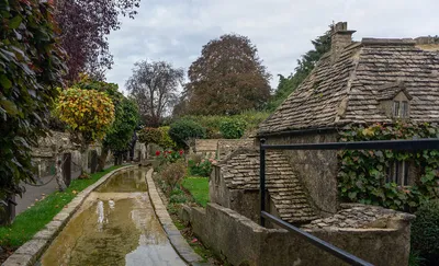 The miniature River Windrush with the bridges at the Model Village of Bourton-on-the-Water.