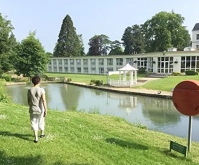 The back of the Cheltenham Park Hotel in 2016, showing two-storey accommodation. A part of the house is seen on the right. The hotel was renamed ‘DoubleTree by Hilton’ from March 2017, following a £4.5m refurbishment.