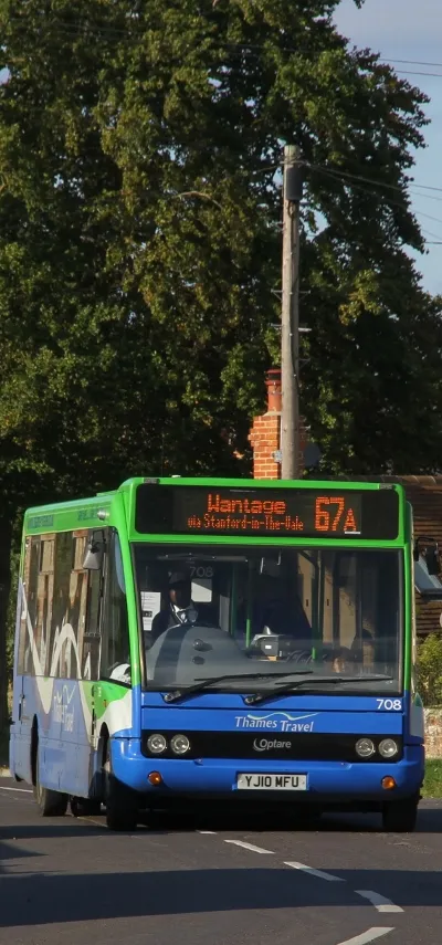 A Thames Travel bus on route 67A in Chapel Road, Stanford in the Vale, Oxfordshire. The bus is an Optare Solo, registration mark YJ10 MFU, fleet number 708.