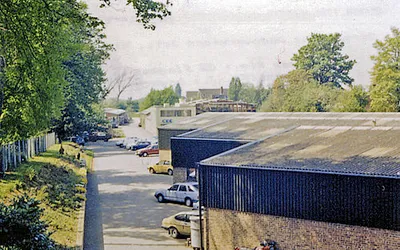 Site of Charlton Kings station, 1987.
View westward, towards Andoversford Junction, Kingham, Swindon Town and Andover Junction: ex-GWR Cheltenham - Kingham branch, also ex-Midland &amp; South Western Joint line to Andover Junction. Nothing is left of the station, which was closed 15/10/62 when the Kingham branch was closed, the ex-M&amp;SWJ line having been closed since 11/9/61.