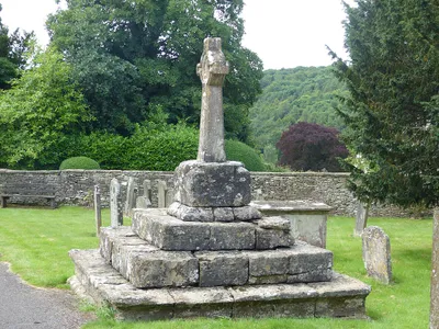 Churchyard cross in St Peter's churchyard: Grade II listed building in Rendcomb, Gloucestershire, UK.
.mw-parser-output .messagebox{margin:4px 0;width:auto;border-collapse:collapse;border:2px solid var(--border-color-progressive,#6485d1);background-color:var(--background-color-neutral-subtle,#fbfcff);color:var(--color-base,#202122);box-sizing:border-box;border-inline-start-width:8px}.mw-parser-output .messagebox.mbox-small{font-size:88%;line-height:1.25em}.mw-parser-output .mbox-warning,.mw-parser-output .mbox-speedy{border:2px solid var(--border-color-error,#b22222);background:var(--background-color-error-subtle,#ffdbdb);border-inline-start-width:8px}.mw-parser-output .mbox-serious,.mw-parser-output .mbox-delete,.mw-parser-output .mbox-stop{border:2px solid var(--border-color-error,#b22222);border-inline-start-width:8px}.mw-parser-output .mbox-issue,.mw-parser-output .mbox-content{border:2px solid #f28500;background:var(--background-color-warning-subtle,#ffe);border-inline-start-width:8px}.mw-parser-output .mbox-query,.mw-parser-output .mbox-style{border:2px solid #f4c430;background:var(--background-color-warning-subtle,#ffe);border-inline-start-width:8px}.mw-parser-output .mbox-shit{border:2px solid #960;border-inline-start-width:8px}.mw-parser-output .mbox-license{border:2px solid #88a;border-inline-start-width:initial}.mw-parser-output .mbox-legal{border:2px solid var(--border-color-notice,#666);background:var(--background-color-base,#fff);border-inline-start-width:8px}.mw-parser-output .mbox-honor{border:2px solid #ca3;background:var(--background-color-warning-subtle,#fcf4db);border-inline-start-width:8px}.mw-parser-output .mbox-growth{border:2px solid #8d4;background:var(--background-color-success-subtle,#d5fdf4);border-inline-start-width:8px}.mw-parser-output .mbox-move{border:2px solid #93c;border-inline-start-width:8px}.mw-parser-output .mbox-protection,.mw-parser-output .mbox-message{border:2px solid var(--border-color-base,#aaa);border-inline-start-width:8px}.mw-parser-output .messagebox .mbox-text{border:none;padding:0.25em 0.9em;width:100%}.mw-parser-output .messagebox .mbox-image{border:none;padding:2px 0 2px 0.9em;text-align:center}.mw-parser-output .messagebox .mbox-imageright{border:none;padding:2px 0.9em 2px 0;text-align:center}.mw-parser-output .messagebox .mbox-empty-cell{border:none;padding:0;width:1px}.mw-parser-output .messagebox .mbox-invalid-type{text-align:center}@media(min-width:720px){.mw-parser-output .messagebox{margin:4px 10%}.mw-parser-output .messagebox.mbox-small{clear:right;float:right;margin:4px 0 4px 1em;width:238px}}body.skin--responsive .mw-parser-output table.messagebox img{max-width:none!important}Wikidata has entry Churchyard cross in St Peter's churchyard (Q17659343) with data related to this item.
