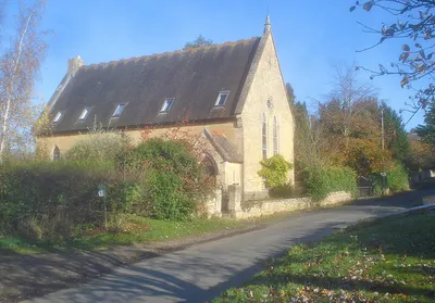 Converted chapel at Westmancote Former Baptist chapel, now converted into a house by inserting a first floor, staircase at this end, windows in the roof and a chimney at the back. Public footpath leading off to the left.
