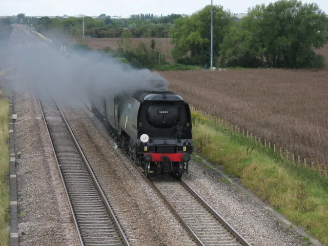 34067 Tangmere light engine &amp; coach at Bourton