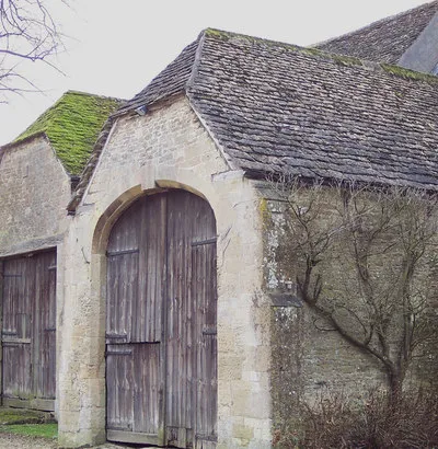 Barn Doors at Great Chalfield Manor Grade I listed barn.  The north bay was built in the 17th century and the 5-bay barn to the south is dated 1752.  Part of the barn is now used as a squash court.