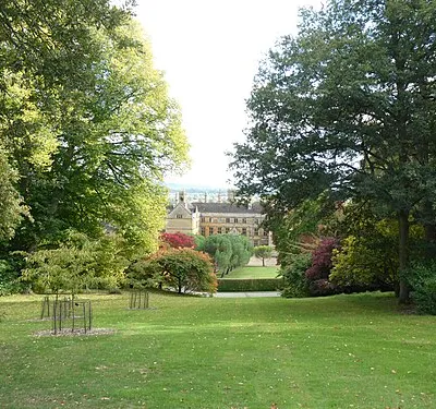 A view of Batsford House from the upper part of the arboretum