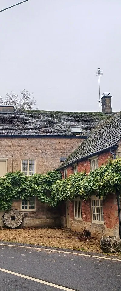 Bledington Mill, beside the B4450 just outside Bledington, Gloucestershire, England. Late 18th century to mid-19th century with later modifications. Grade II listed.