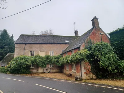 Bledington Mill, beside the B4450 just outside Bledington, Gloucestershire, England. Late 18th century to mid-19th century with later modifications. Grade II listed.