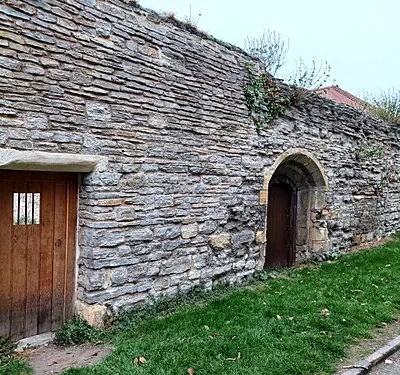Abbot Reginald's Wall, part of the ruins of Evesham Abbey, Evesham, Worcester, England. Medieval. Grade II listed.